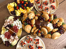 Load image into Gallery viewer, Assorted platter with bread, fruits, and cheese on a wooden table