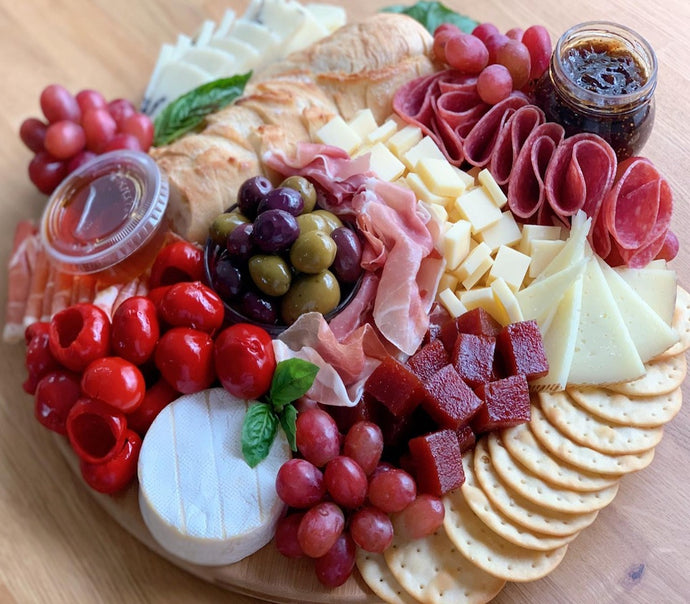 cheese platter, cheese board, truffle cheese, manchego cheese, fig spread