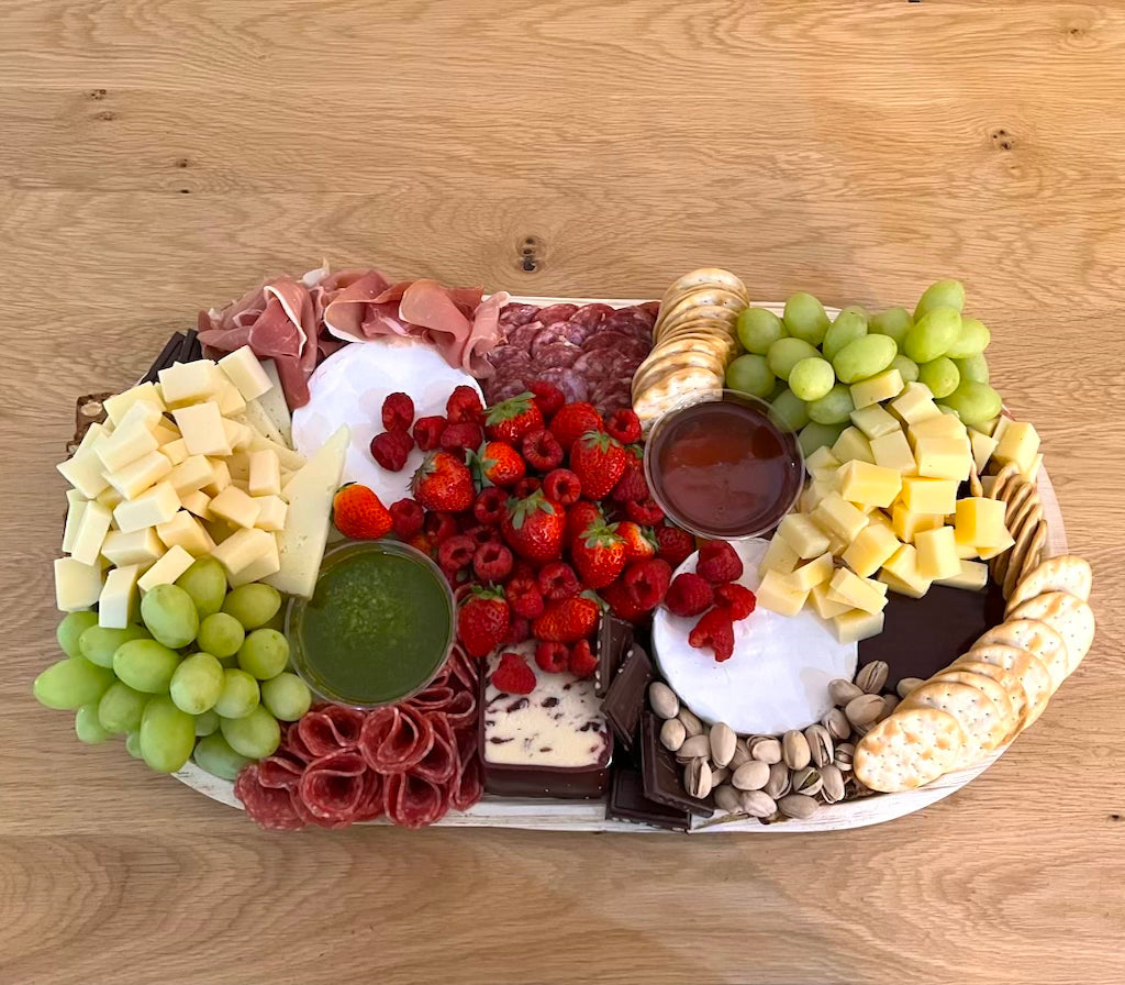 deluxe board, cheese platter, charcuterie, charcuterie board