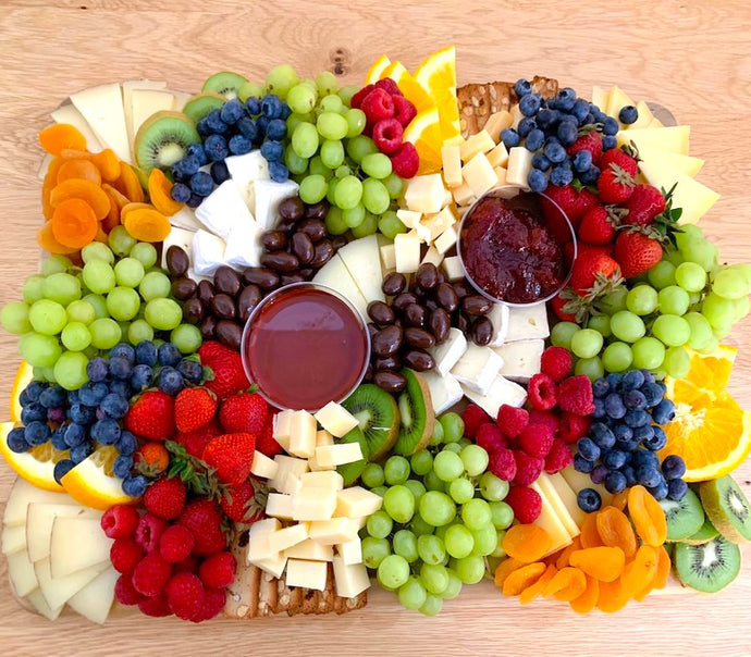 manchego cheese, cheese platter, party platter, honey, green grapes, cheese board, kiwi